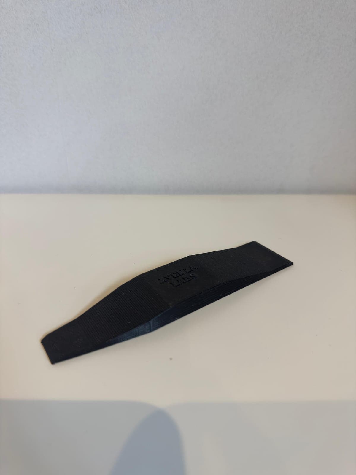 Avenza Labs branded levelling wedge, 3D printed in black